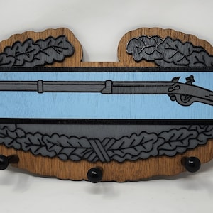 Custom made US Military Combat Infantry Badge. Laser cut Wooden 5 peg Hat Rack. Multi-layered painted hat rack.