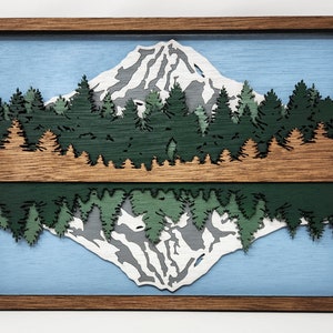 Mount Rainier mountain scene with reflection. 3D, multilayered scene. Laser cut and laser etched lines on the side, stained and painted.
