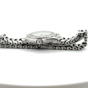 May include: A silver wristwatch with a silver metal band. The watch has a white face with black markings and a silver bezel.