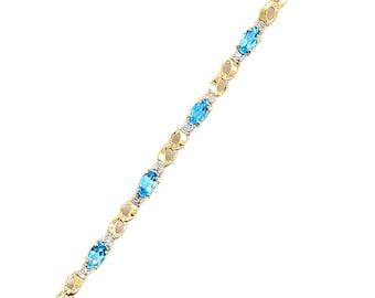 10K Yellow Gold Blue Topaz Bracelet: December Birthstone Jewelry