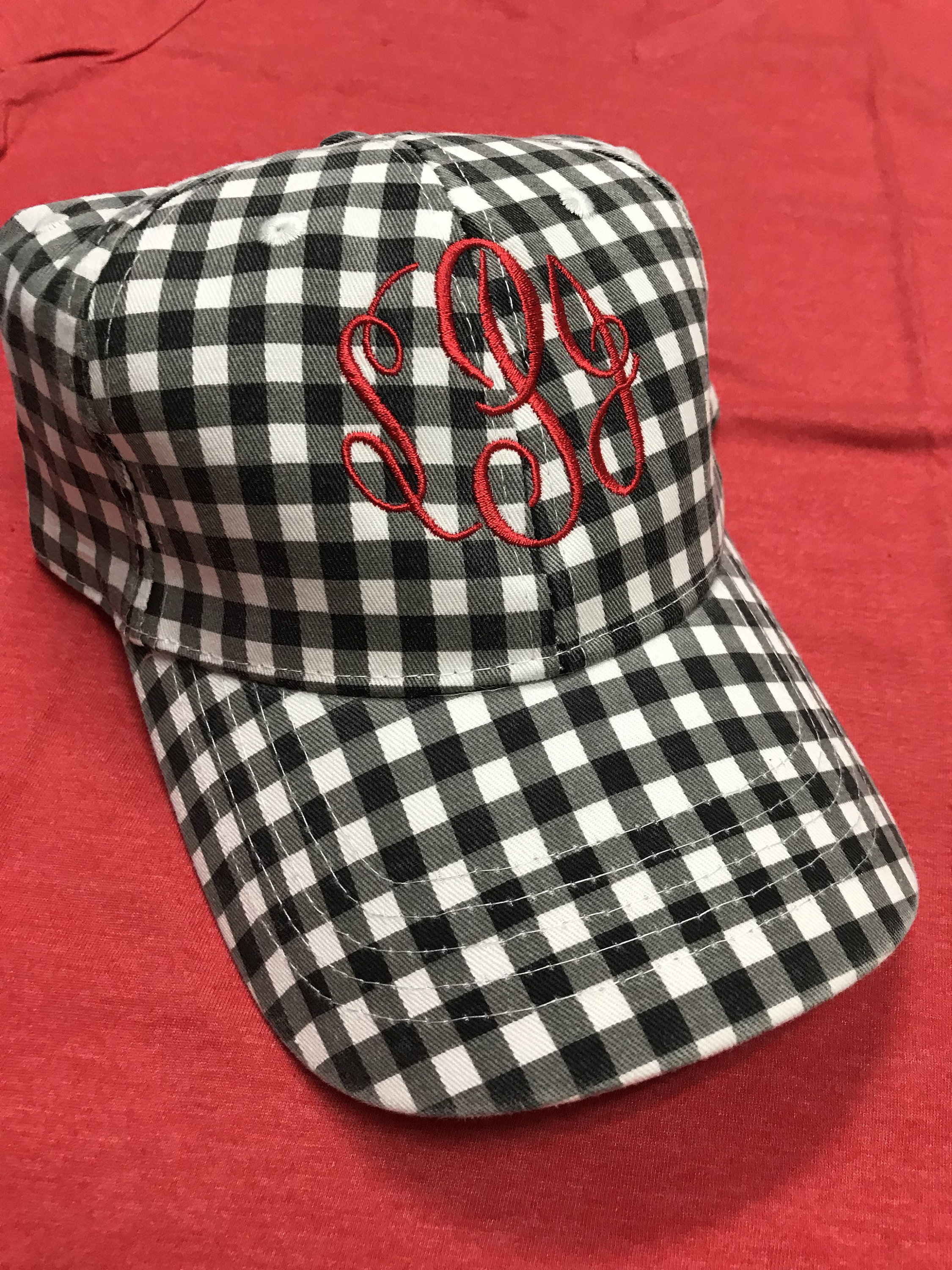 white monogrammed hat