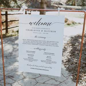 May include: A white welcome sign with black text for a wedding ceremony. The sign includes the names Charlotte & Matthew, the date August 8th, 2024, and the location New York. The sign also includes the order of the ceremony, the wedding party, and a thank you message to guests.
