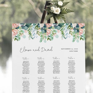 May include: A wedding seating chart with a floral design. The chart is on an easel and lists the names of guests and their assigned tables. The text on the chart reads "Eloise and David" and "September 11, 2019, New York".