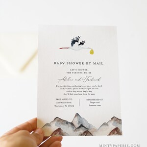 May include: A baby shower by mail invitation with a watercolor illustration of a stork carrying a yellow package over a mountain range. The invitation includes the text "Baby Shower by Mail", "Let's Shower the Parents-to-be", "Abeline and Frederick", "Mail Gifts to 501 Willow Blvd. Westwood, NJ 07309", and "Registered at Target and Amazon.com".