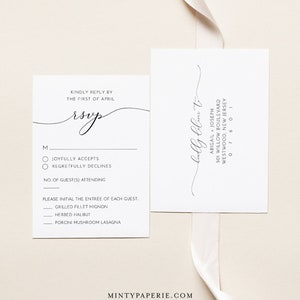 May include: A white RSVP card with a black script font that says "RSVP" and a checklist for guests to indicate their attendance. The card also includes a list of dinner options: Grilled Filet Mignon, Herbed Halibut, and Porcini Mushroom Lasagna.