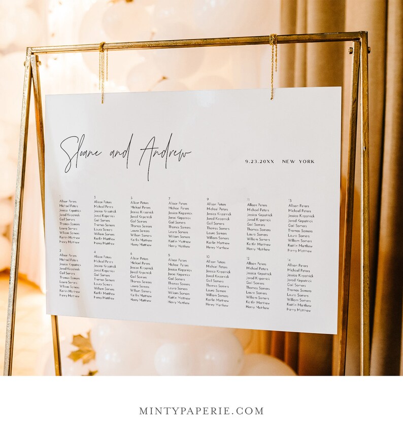 May include: A white wedding seating chart with black text. The chart is titled "Sloane and Andrew" and lists the names of guests under table numbers 1 through 16. The date "9.23.20XX" and location "NEW YORK" are printed at the top right corner of the chart.