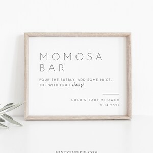 May include: A framed sign with the text "MOMOSA BAR" and instructions for making a mimosa. The sign also includes the text "LULU'S BABY SHOWER 9.14.2021".