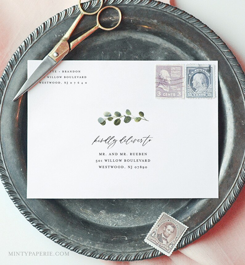 May include: A white envelope with a green leafy design and the text "kindly deliver to" followed by an address. The envelope has two stamps, one with the text "United States Postage 3 Cents 3" and the other with the text "15 Cents 15".