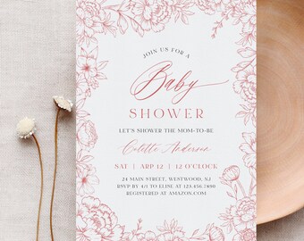 Może przedstawiać: Białe zaproszenie na baby shower z różową kwiatową ramką. Tekst brzmi "Join us for a Baby Shower, Let's shower the mom-to-be Colette Anderson, Sat | Apr 12 | 12 o'clock, 24 Main Street, Westwood, NJ, RSVP by 4/1 to Elise at 123.456.7890, Registered at Amazon.com".