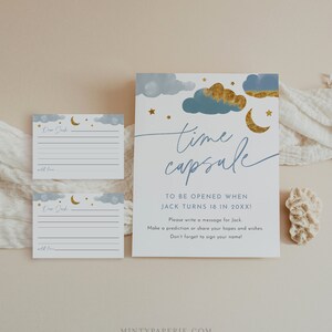 May include: A blue and gold time capsule card with clouds and stars. The text reads "time capsule" and "To be opened when Jack turns 18 in 20XXI". There are two blank cards with lines for writing messages.