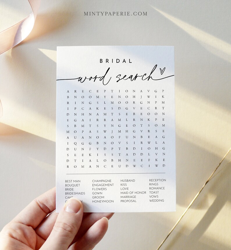 May include: A printable bridal word search game with a white background and black text. The words to find are: best man, bouquet, bride, bridesmaids, cake, champagne, engagement, flowers, gown, groom, honeymoon, husband, kiss, love, maid of honor, marriage, proposal, reception, rings, romance, toast, vows, wedding.