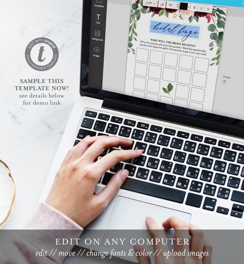 May include: A laptop computer displaying a bridal bingo game template with a floral design. The template has a blue title that says "bridal bingo" and asks "What will the bride receive?" The template has a 5x5 grid with squares to fill in. The laptop is on a white surface.
