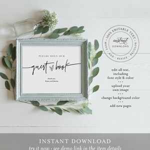 May include: A printable sign in a light blue frame with the text "PLEASE SIGN OUR guest book" and "thank you, Katie and Martin". The sign is on a white wooden surface with green leaves.
