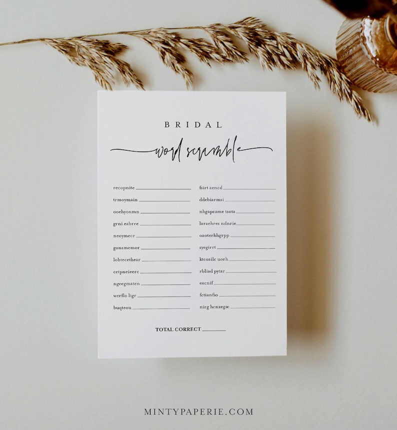 May include: A printable bridal word scramble game with a black and white design. The game features a list of words related to weddings, such as "bride", "groom", and "wedding".