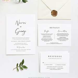 May include: Wedding invitation suite with a white background and black text. The invitation card features the names "Narmi + George" in a handwritten script font. The details card includes information about the reception, accommodations, and transportation. The response card has a section for guests to RSVP and choose their meal option.