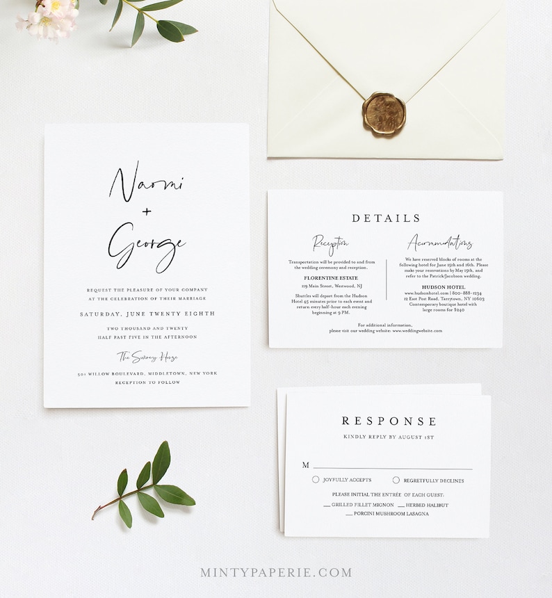 May include: Wedding invitation suite with a white background and black text. The invitation card features the names "Narmi + George" in a handwritten script font. The details card includes information about the reception, accommodations, and transportation. The response card has a section for guests to RSVP and choose their meal option.
