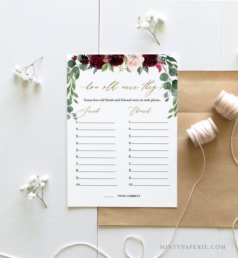 May include: A printable game card with a floral design in shades of burgundy, pink, and green. The card has the text "How old were they?" and "Guess how old Sarah and Edward were in each photo." with spaces to write in numbers.