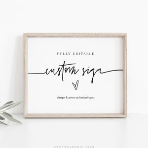May include: A framed printable sign with the text "FULLY EDITABLE custom sign" and a small heart symbol. The text "design & print unlimited signs" is below the main text. The sign is in a light wood frame and is on a white surface.
