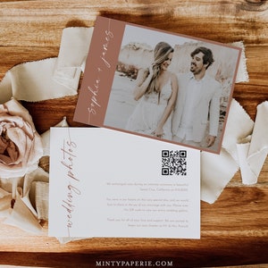 May include: A white card with the text "wedding photos" written in cursive script. The card also includes a QR code and a message about the couple's wedding photos. The message reads: "We exchanged vows during an intimate ceremony in beautiful Santa Cruz, California on 9.15.20XX. You were in our hearts on this very special day, and we would love to share in the joy of our marriage with you. Please scan this QR code to view our entire wedding gallery. Thank you for all of your love and support. We are excited to begin our next chapter as Mr. & Mrs. Patrick!"