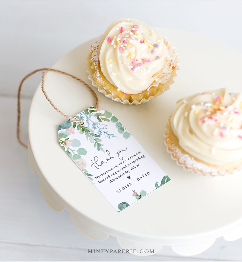 May include: A green and white floral thank you tag with the text "thank you" and "We thank you for your continuous love and support and for spending this special day with us. ELOISE, DAVID".