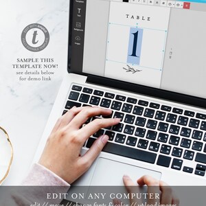 May include: A laptop computer screen displaying a table number template with the text "TABLE 1" in a light blue box with a small branch design. The text "EDIT ON ANY COMPUTER" is displayed below the laptop screen with the text "edit // move // change fonts & color // upload images".