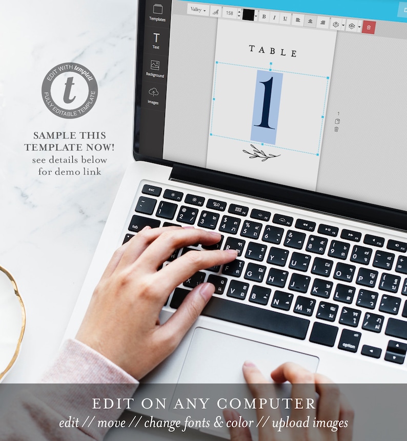 May include: A laptop computer screen displaying a table number template with the text "TABLE 1" in a light blue box with a small branch design. The text "EDIT ON ANY COMPUTER" is displayed below the laptop screen with the text "edit // move // change fonts & color // upload images".