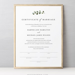 May include: A printable certificate of marriage with a simple design featuring a eucalyptus branch illustration. The text reads "Certificate of Marriage" and includes the names of the bride and groom, the date, and the location of the wedding. The document also includes lines for the bride, groom, maid of honor, best man, and officiant to sign.