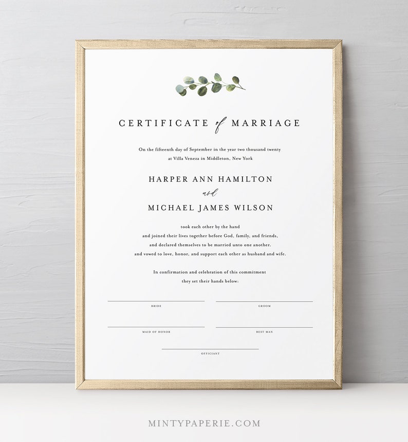 May include: A printable certificate of marriage with a simple design featuring a eucalyptus branch illustration. The text reads "Certificate of Marriage" and includes the names of the bride and groom, the date, and the location of the wedding. The document also includes lines for the bride, groom, maid of honor, best man, and officiant to sign.