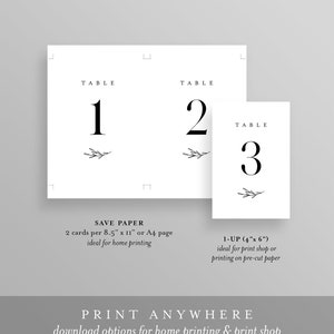 May include: Printable table number cards with a simple, minimalist design. The cards feature a black number with a small sprig of greenery. The text "TABLE" is printed above the number. The cards are designed to be printed on 8.5 x 11 inch paper or A4 paper. The text "SAVE PAPER" is printed below the cards. The text "1-UP (4" x 6")" is printed below the cards. The text "PRINT ANYWHERE" is printed below the cards. The text "download options for home printing & print shop" is printed below the cards.