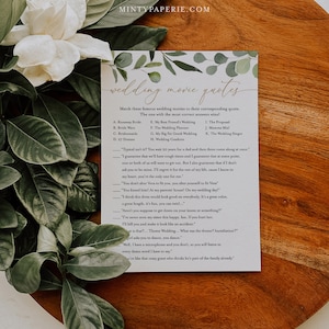 Peut inclure: Un jeu de mariage imprimable avec une bordure de feuilles vertes. Le jeu demande aux joueurs de faire correspondre des citations de films de mariage c&eacute;l&egrave;bres &agrave; leur film correspondant. Les citations sont list&eacute;es dans une colonne sur le c&ocirc;t&eacute; droit de la page.