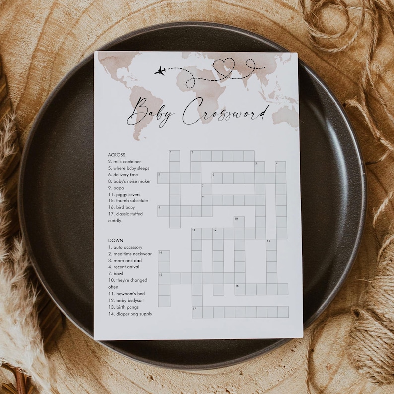 May include: A printable baby shower game in the form of a crossword puzzle. The crossword puzzle is on a white background with a brown watercolor world map design. The crossword puzzle has the title "Baby Crossword" and includes clues for words related to babies and new parents.