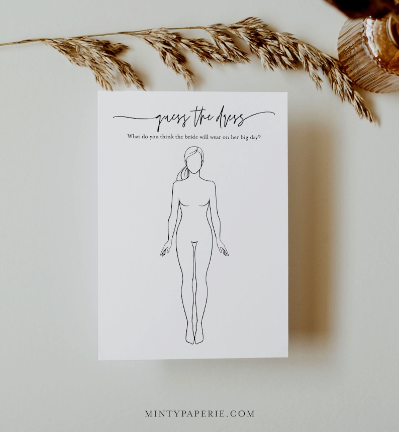 May include: A printable wedding game card with the text "guess the dress" and a line drawing of a woman's body. The text below the drawing says "What do you think the bride will wear on her big day?"