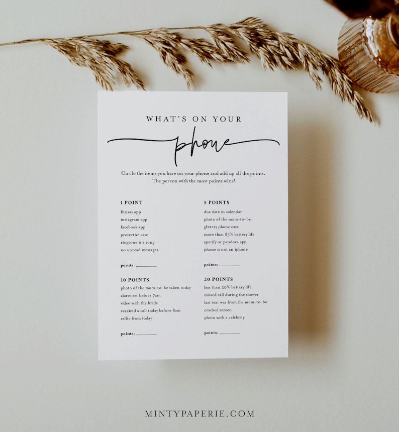May include: A printable game card with the title "What's on your phone" and a list of items to check on your phone for points. The game is designed for a party or gathering.