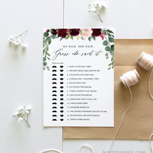 May include: A printable game card with a floral design in shades of burgundy and pink. The card features the text "He Said. She Said. Guess Who Said It." and a list of 14 statements about relationships. Players circle the icon representing who they think said each statement.