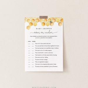 May include: A printable baby shower game card with a honeycomb pattern and a bee illustration. The game is called "Over or Under" and asks guests to guess whether the numbers in the statements are over or under the correct numbers.