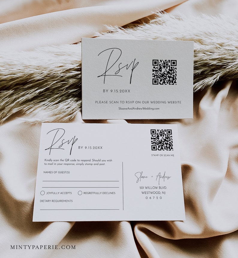 May include: A white RSVP card with a black and white QR code. The card has the text "RSVP" in a script font and the date "BY 9.15.20XX". The card also has the text "PLEASE SCAN TO RSVP ON OUR WEDDING WEBSITE SloaneAndAndrewWedding.com".