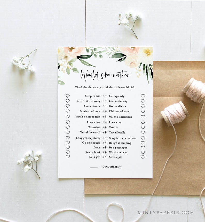 May include: A printable bridal shower game with a floral design. The game asks guests to guess which of two choices the bride would prefer. The game includes questions like "Sleep in late or Get up early?" and "Own a dog or Own a cat?"