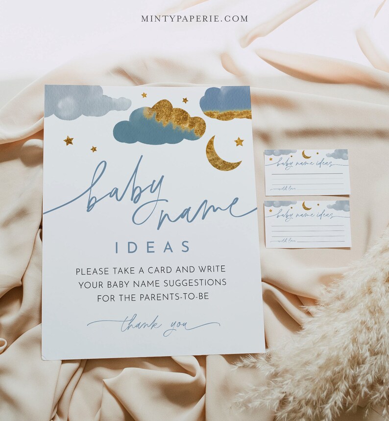 May include: A white card with blue and gold watercolor clouds, stars, and a crescent moon. The text reads "baby name ideas" and "Please take a card and write your baby name suggestions for the parents-to-be. Thank you."