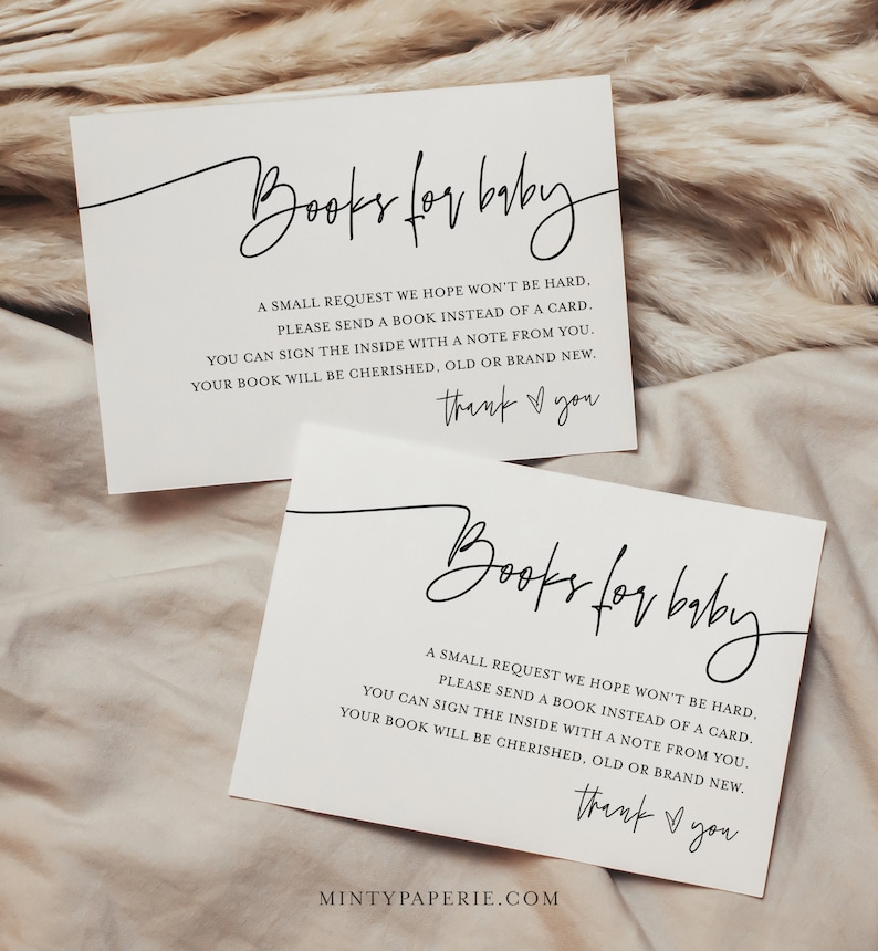 May include: Two white cards with black text that reads "Books for baby". The text on the cards requests guests to bring a book instead of a card for the baby. The cards also include the text "thank you".