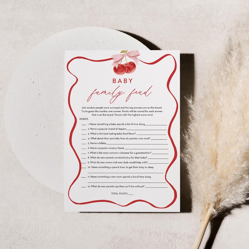 May include: A printable baby shower game with a red and white cherry design. The game is called "Baby Family Feud" and asks players to guess the top answers to questions about babies.