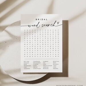 May include: A printable bridal word search puzzle with a white background and black text. The puzzle includes words related to a wedding, such as reception, ceremony, vows, and honeymoon.