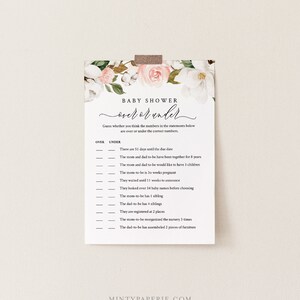 May include: A printable baby shower game card with a floral design. The game is called "Over or Under" and asks guests to guess whether the numbers in the statements are over or under the correct number. The card has a pink and white floral design with a white background.