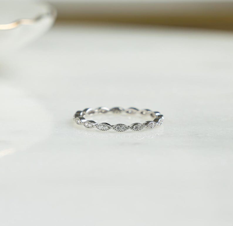 Closeup image of dainty 925 sterling silver stacking ring
