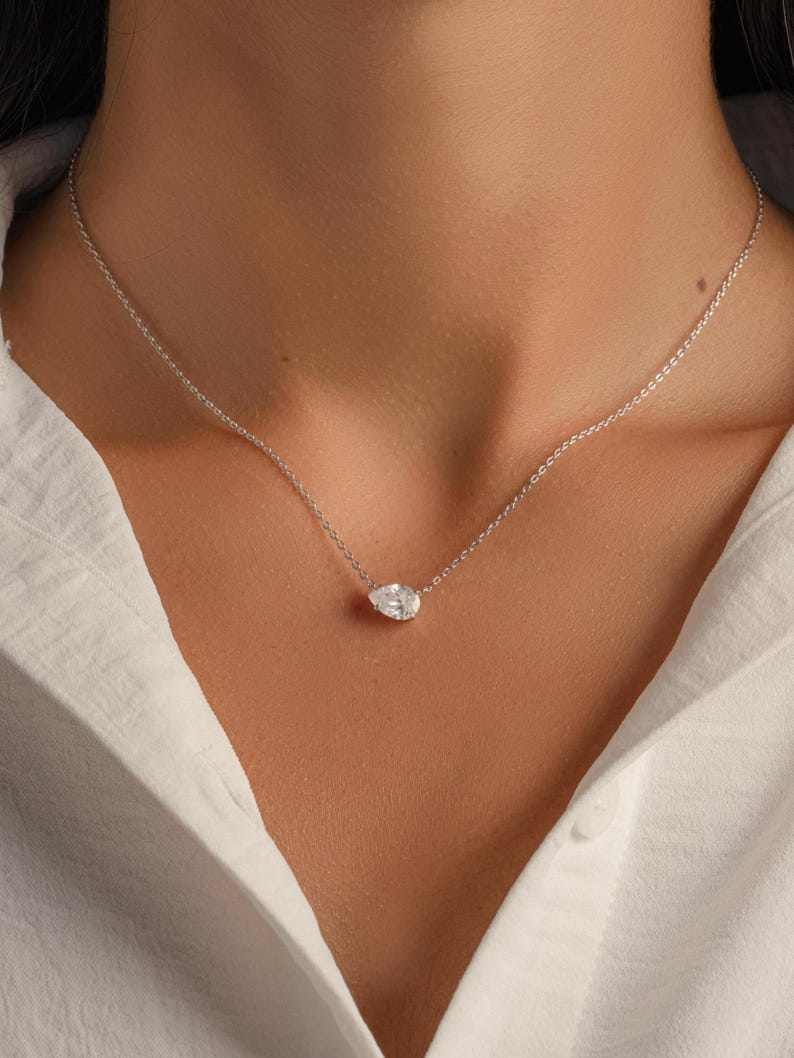 Model wearing sterling silver dainty diamond necklace