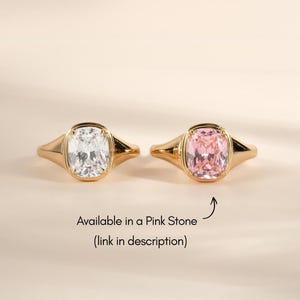 Elongated cushion cut ring shown in the classic diamond cz stone and the pink stone colorway option