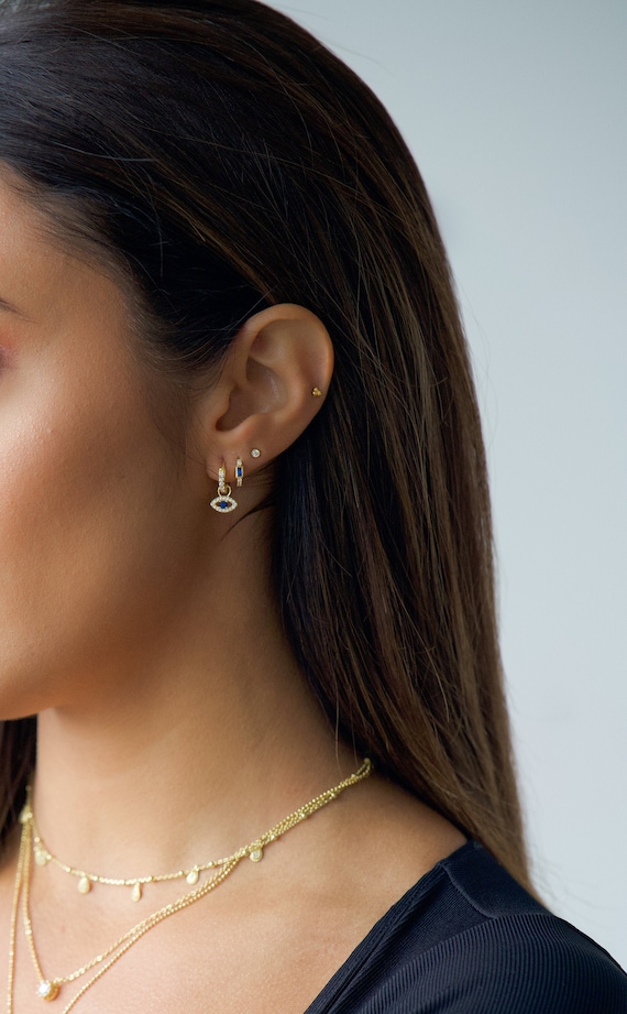 Tiny evil eye earrings deals