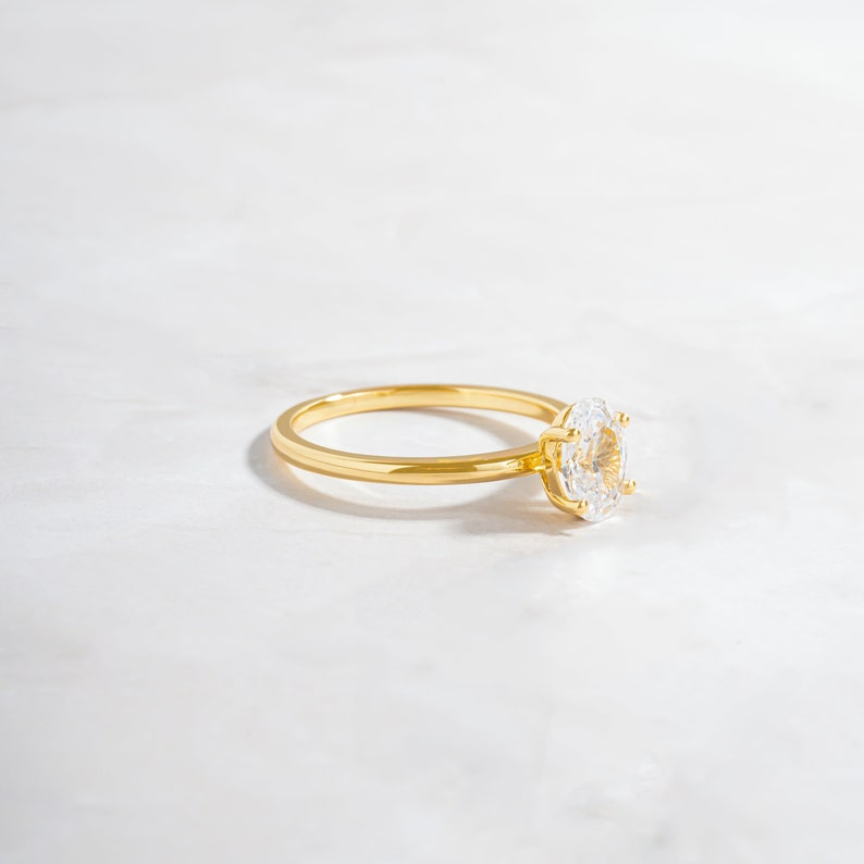 gold solitaire anniversary ring