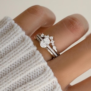 Sterling silver diamond ring set on model