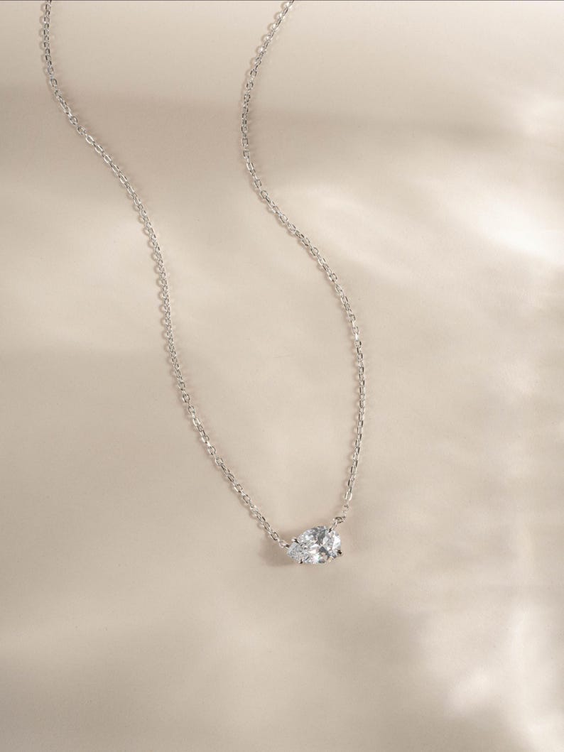 Silver chain necklace with cubic zirconia diamond pendant
