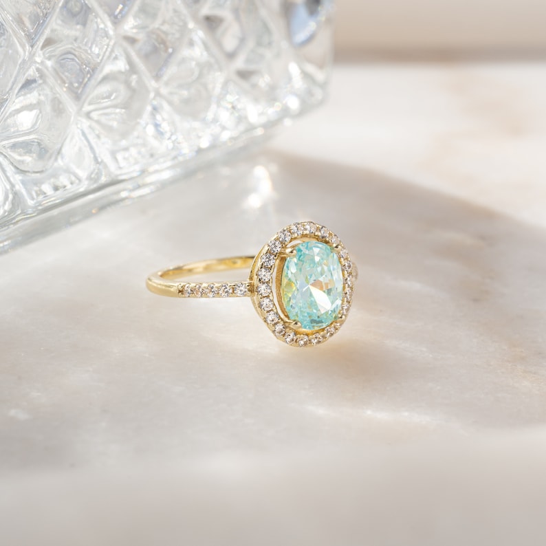 gemstone halo aquamarine blue topaz ring